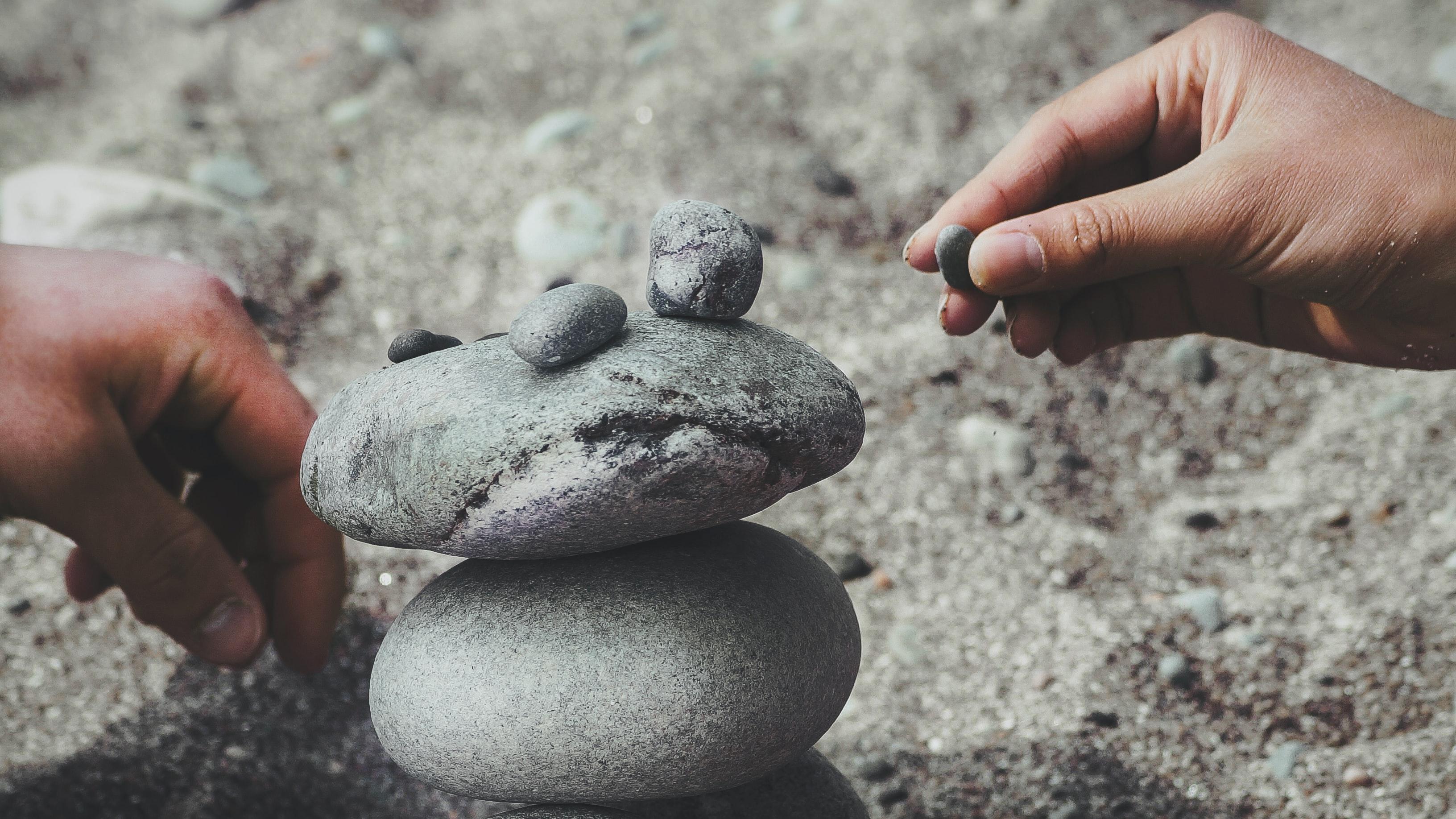 Projects category - person building rock tower